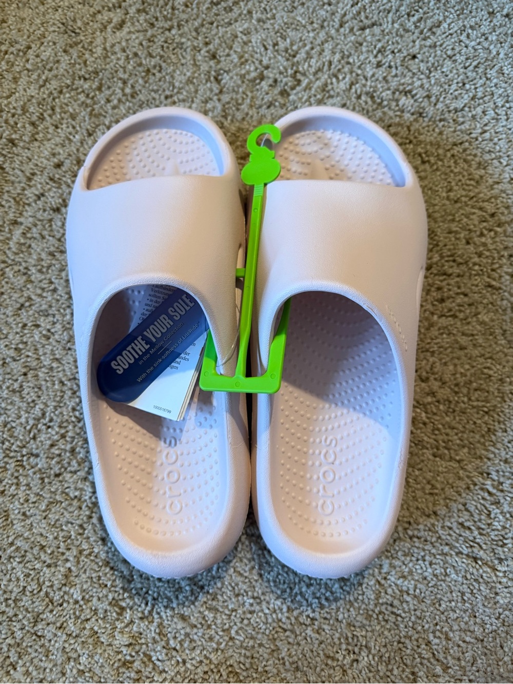 2 pairs of women’s Crocs size 8